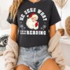 Santa Claus He Sees What You’ve Been Reading Christmas T-Shirt
