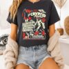 Cryptid Rodeo Mothman’s Famous Moonshine Boot Scootin’ Bigfoot T-Shirt