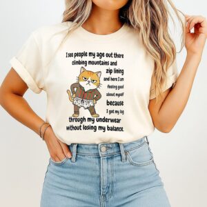 I See People My Age Out There Climbing Mountains And Zip Lining Meme Cat T-Shirt