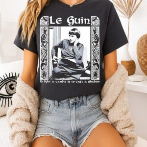 Ursula K Le Guin To Light A Candle Is To Cast A Shadow T-Shirt